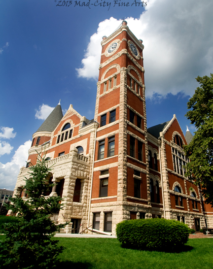 The historic Green County courthouse in Monroe, WI features a clock tower.