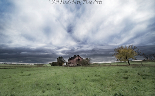A barn stands alone in a Jefferson COunty storm.